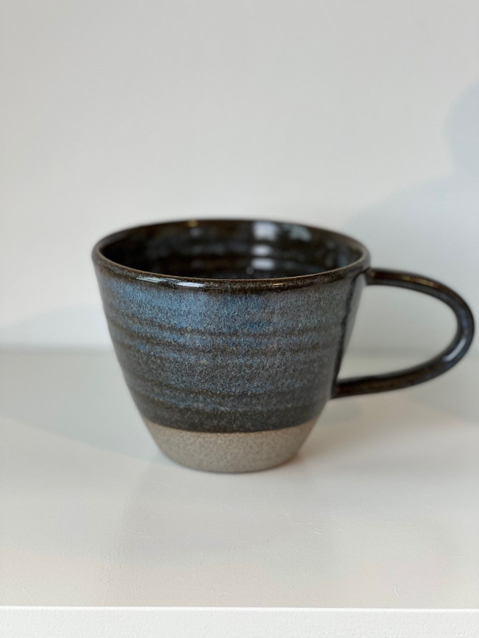 Cappucino Cup gråblå på gråt ler